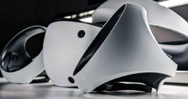 a pair of speakers sitting on top of a table